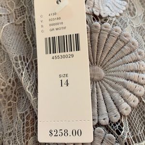 New with tags. Never been worn size 14 dress from anthropology